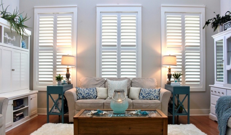 Sacramento designer home with white shutters 